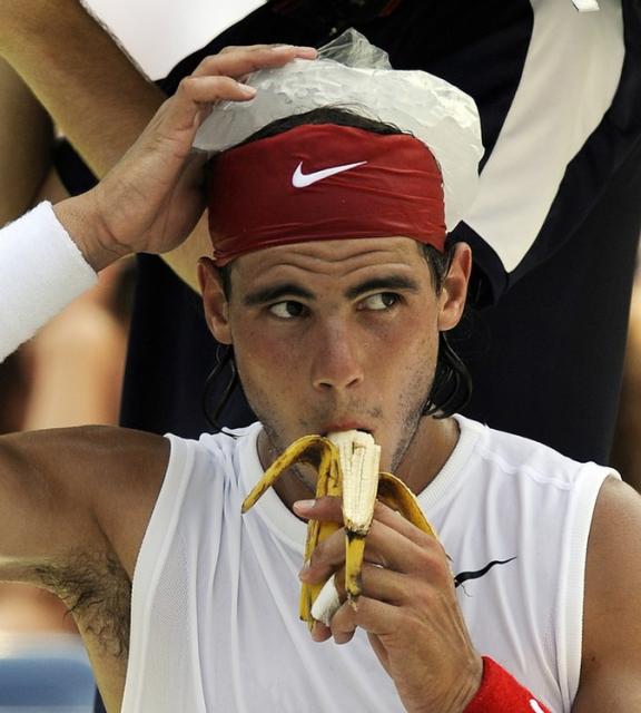 Rafael Nadal eats a banana