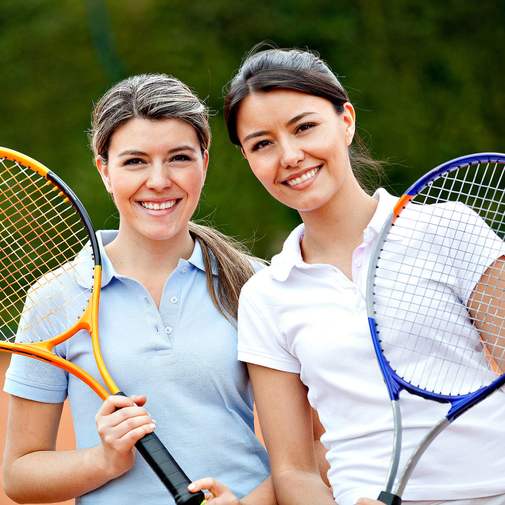 Women playing tennis