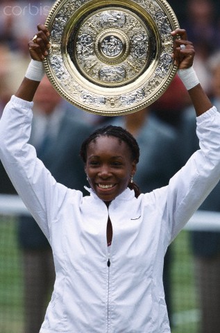 Venus Williams Holding up Her Wimbledon Trophy