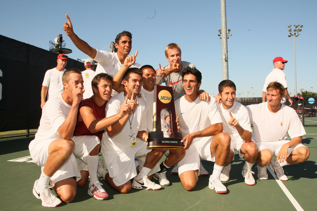 19 MAY 2009: Members of the of the University of Southern California tennis team pose with the NCAA Championship trophy after clinching the title against Ohio State University during the Division I Men's Tennis Championship held at the George P. Mitchell Tennis Center on the Texas A&M University campus in College Station, TX. Southern California defeated Ohio State 4-1 to claim the national title. Darren Carroll/NCAA Photos